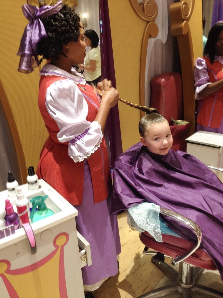 Braiding Hair at Bibbidi Bobbidi Boutique at Disney World